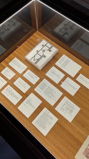 Vitrine of Fluxus event score cards